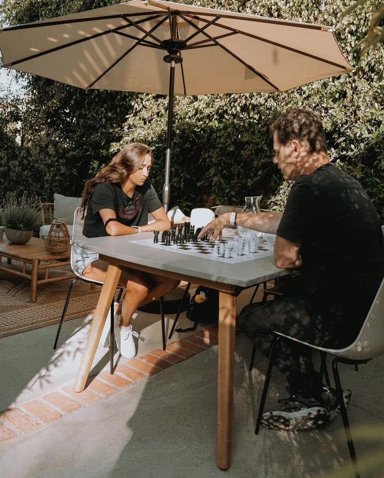 Anita Alvarez and Seth Makowsky playing chess